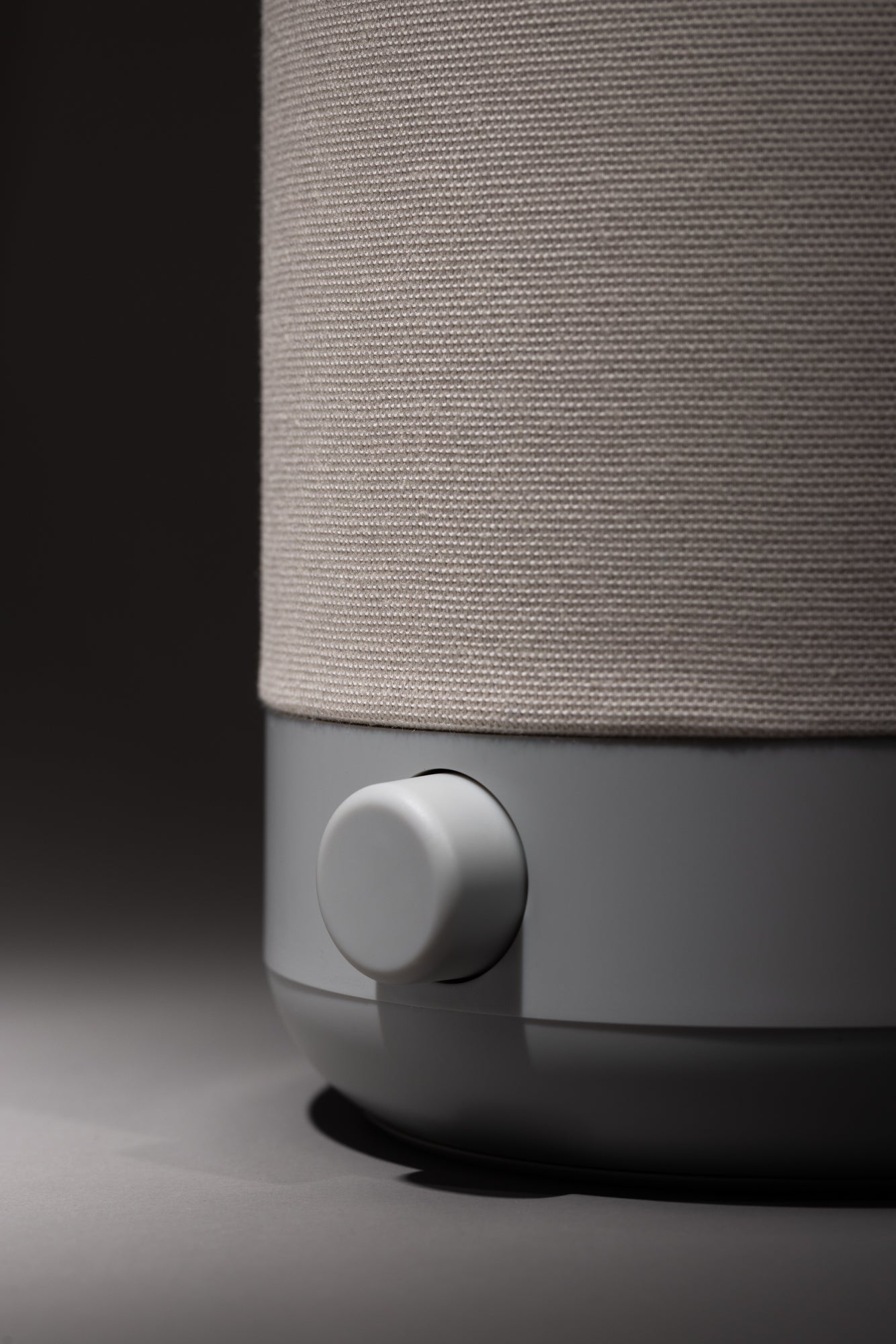 Closeup of a gray dimmer knob on a lamp