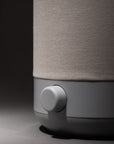 Closeup of a gray dimmer knob on a lamp