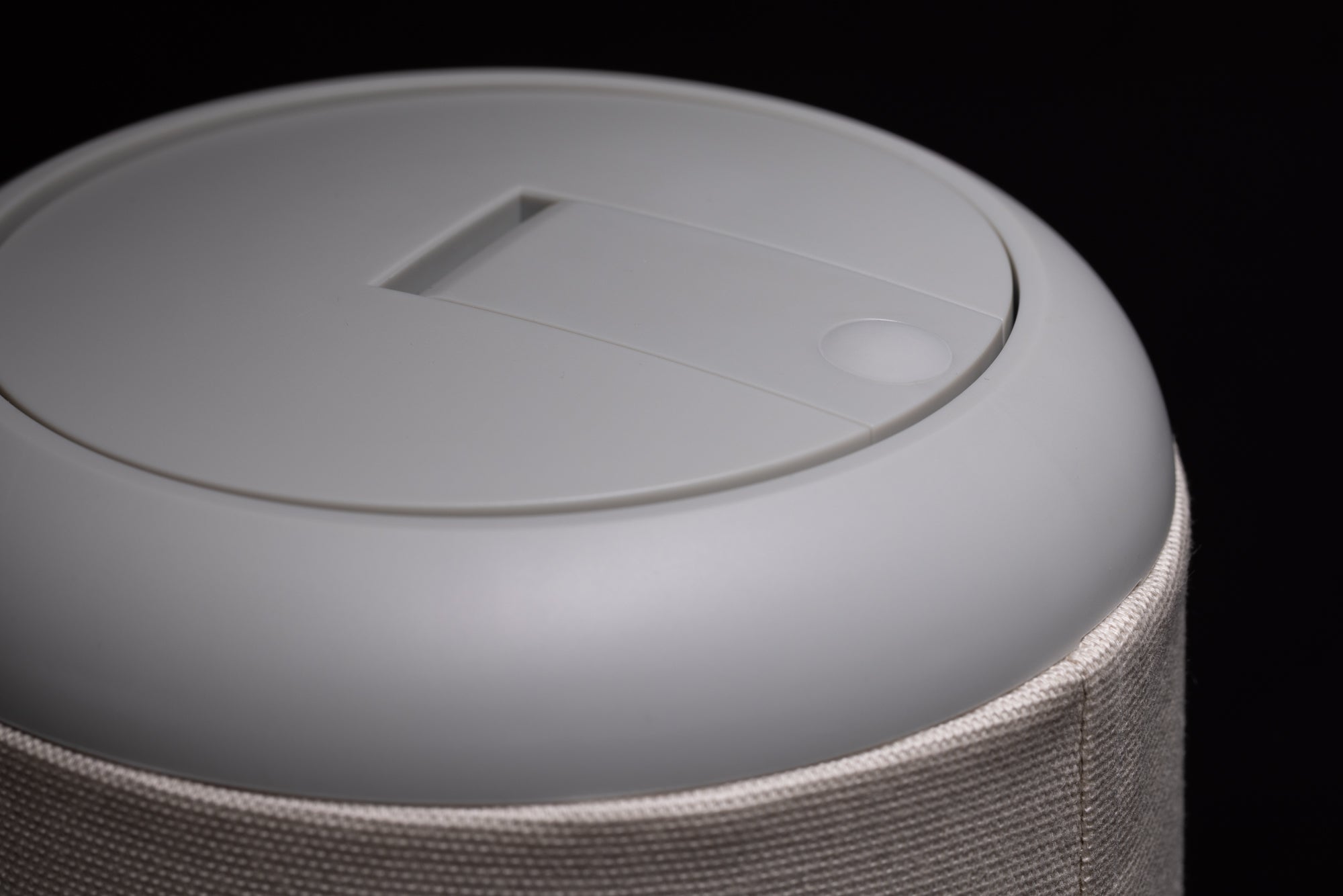 Closeup of the top of a gray Nightside lamp