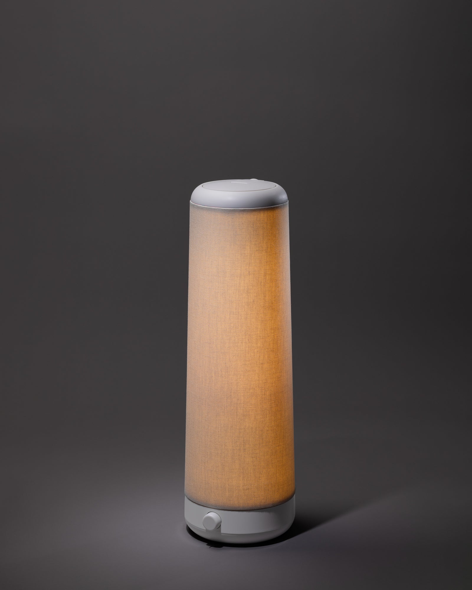 Nightside NS01 Task Lamp with LED spotlight hidden inside ambient fabric shade – minimalist task and nightstand lighting solution.