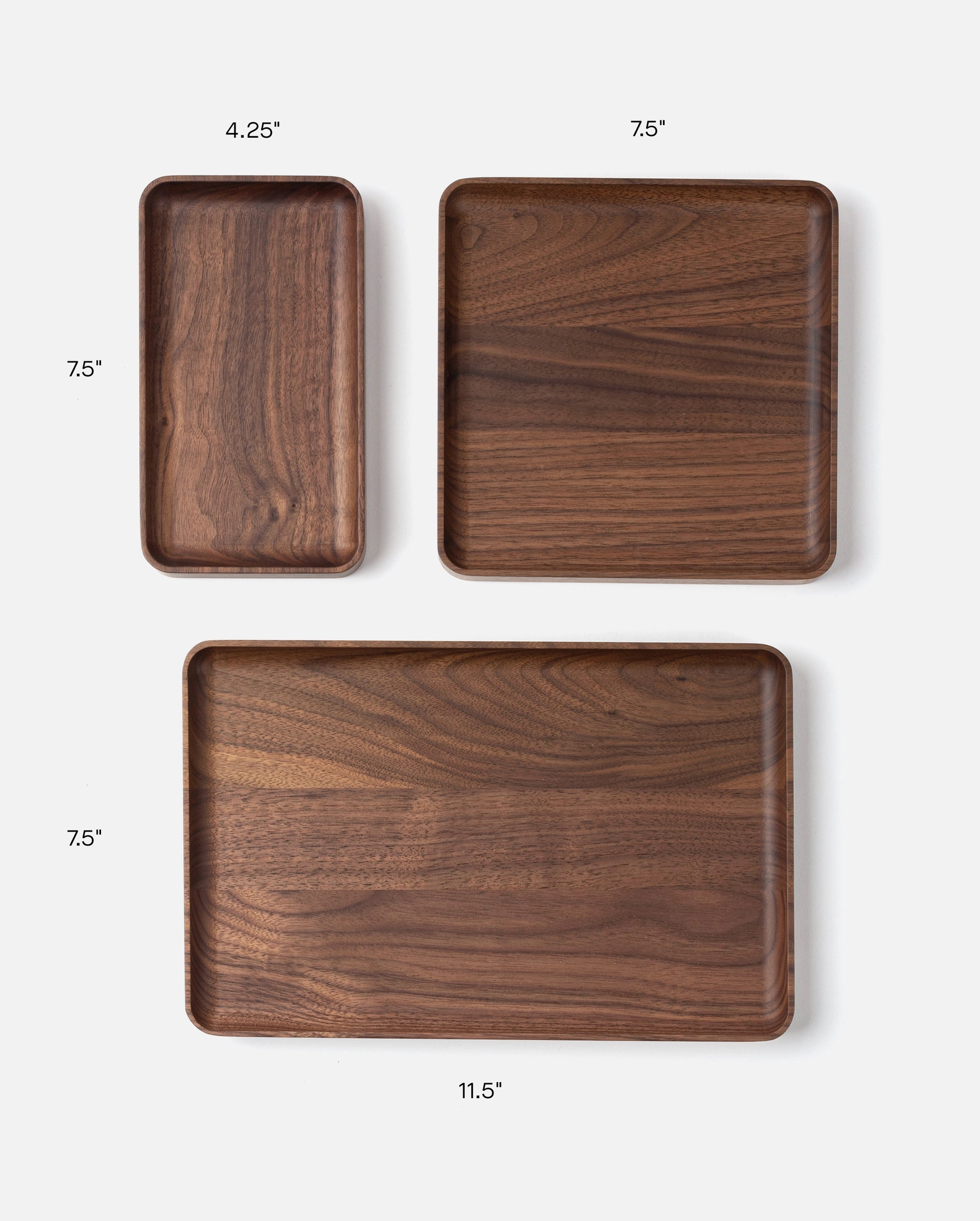 The Ugmonk Valet Tray Bundle features three handcrafted solid walnut trays, each on a white background and labeled with its size: 4.25x7.5”, 7.5x7.5”, and 11.5x7.5”.