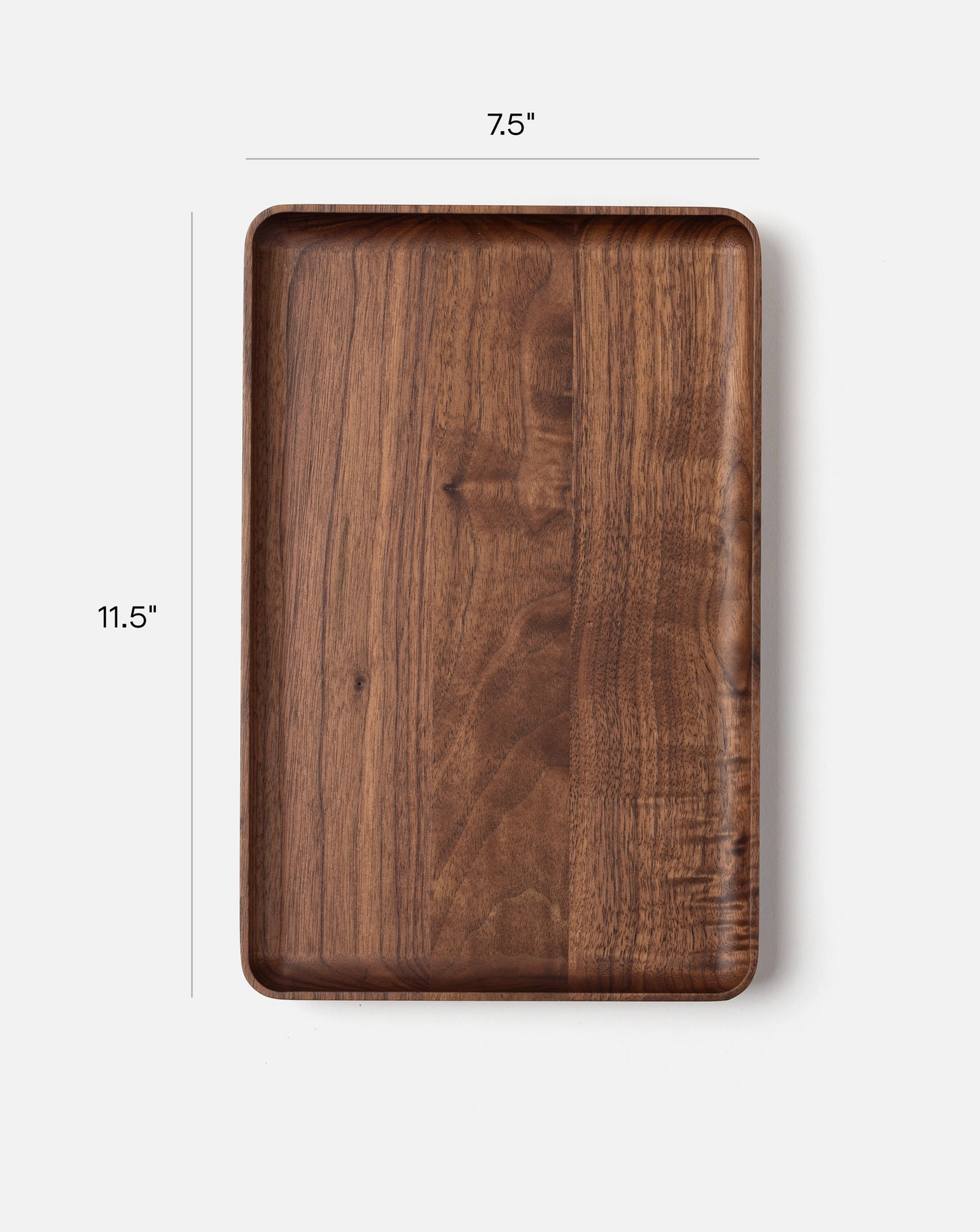 The Ugmonk Valet Tray - Large is a rectangular walnut tray with a matte finish and rounded edges, measuring 11.5 x 7.5, displayed from above on a plain background.