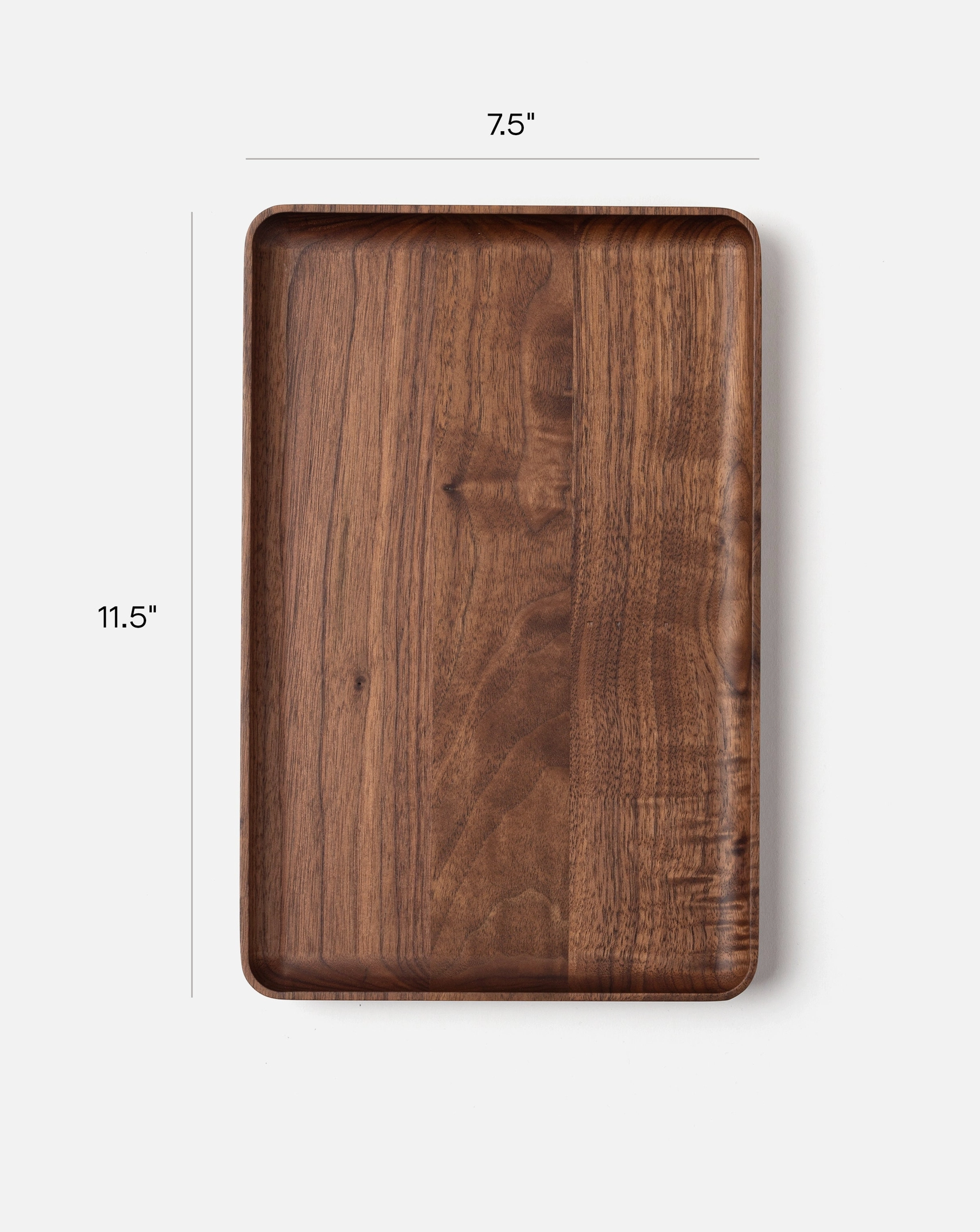 The Ugmonk Valet Tray - Large is a rectangular walnut tray with a matte finish and rounded edges, measuring 11.5 x 7.5, displayed from above on a plain background.