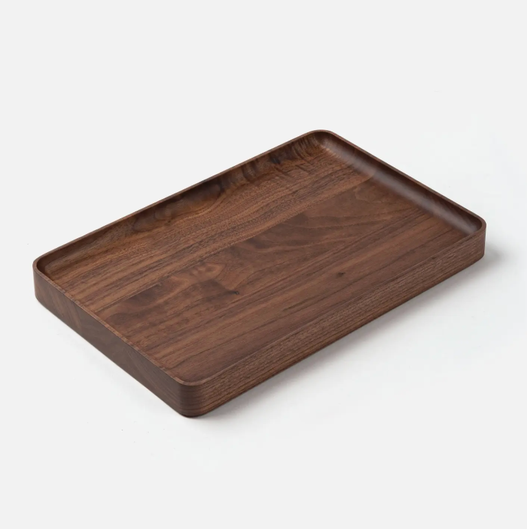 The Ugmonk Valet Tray - Large is a rectangular walnut tray with raised edges and a smooth, matte finish, precision milled for quality, shown against a plain white background.