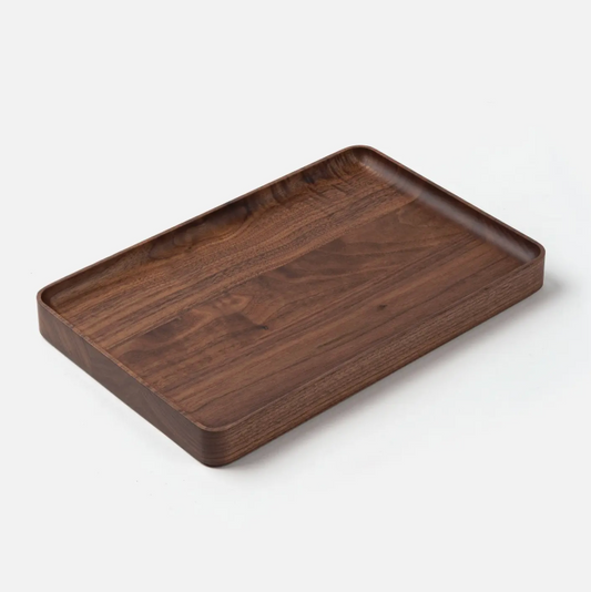 The Ugmonk Valet Tray - Large is a rectangular walnut tray with raised edges and a smooth, matte finish, precision milled for quality, shown against a plain white background.